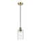 Candor Mini Pendant shown in the Antique Brass finish with a Clear Waterglass shade