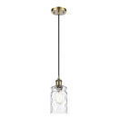 Candor Mini Pendant shown in the Antique Brass finish with a Clear Waterglass shade