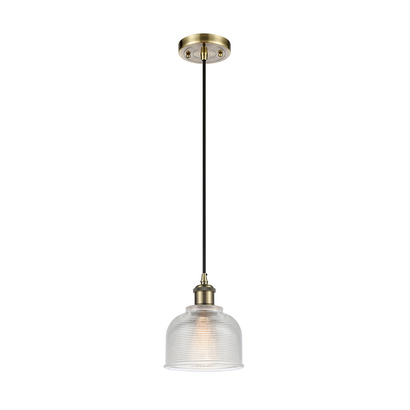Dayton Mini Pendant shown in the Antique Brass finish with a Clear shade