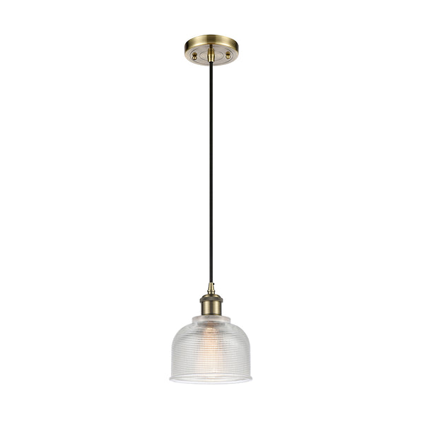 Dayton Mini Pendant shown in the Antique Brass finish with a Clear shade