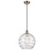 Deco Swirl Mini Pendant shown in the Antique Copper finish with a Clear shade