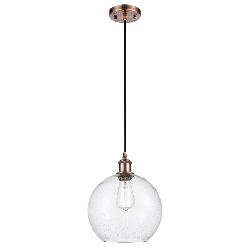 Athens Mini Pendant shown in the Antique Copper finish with a Seedy shade