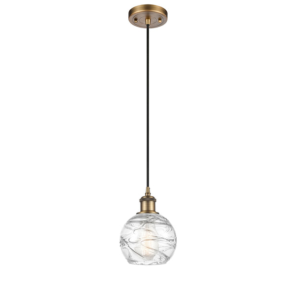 Deco Swirl Mini Pendant shown in the Brushed Brass finish with a Clear shade