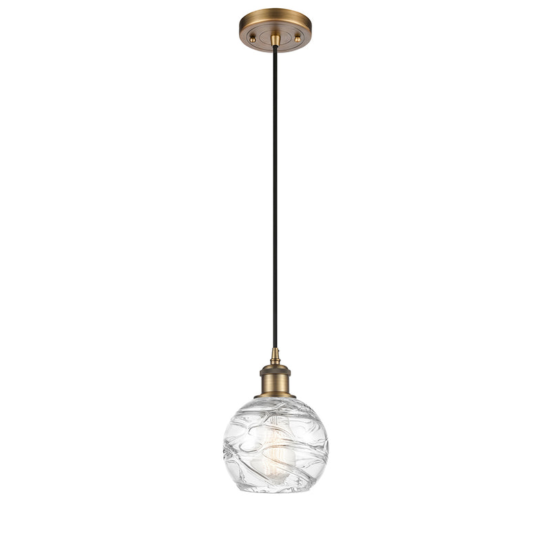 Deco Swirl Mini Pendant shown in the Brushed Brass finish with a Clear shade