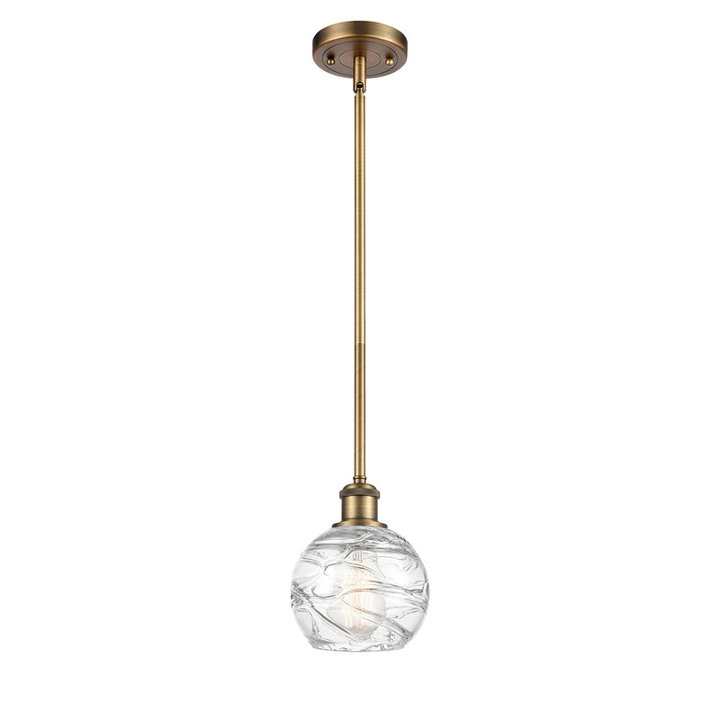 Deco Swirl Mini Pendant shown in the Brushed Brass finish with a Clear shade