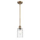 Candor Mini Pendant shown in the Brushed Brass finish with a Clear Waterglass shade