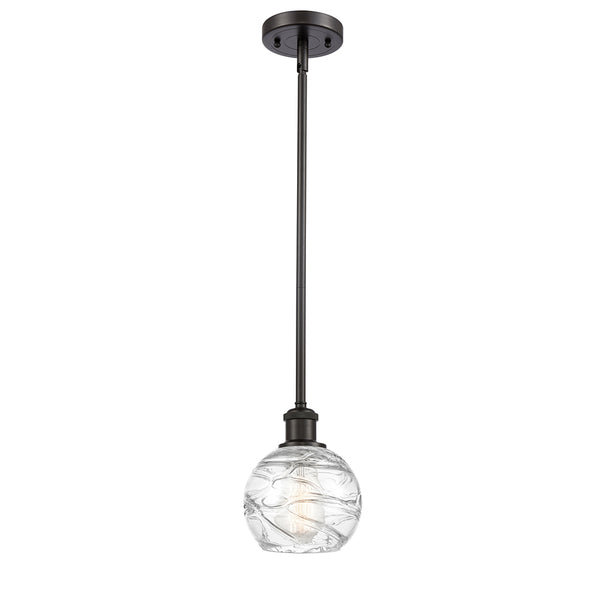 Deco Swirl Mini Pendant shown in the Oil Rubbed Bronze finish with a Clear shade