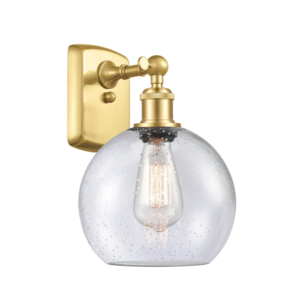 Athens Sconce shown in the Satin Gold finish with a Seedy shade