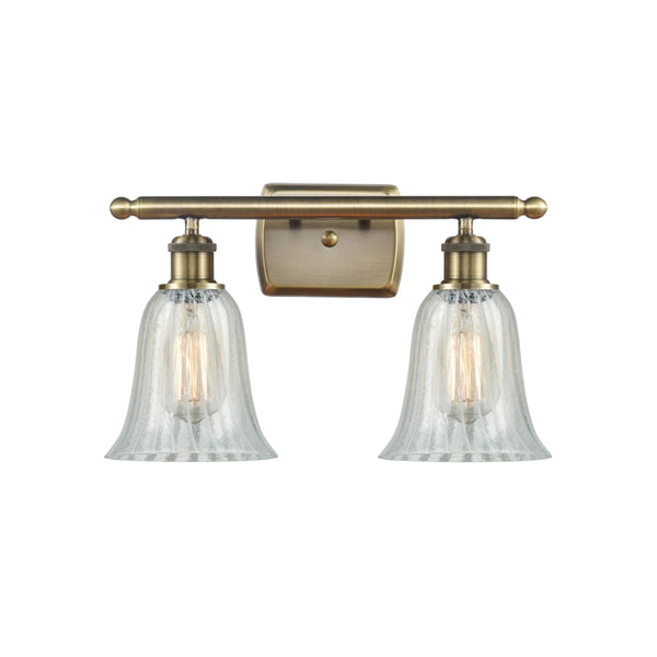 Hanover Bath Vanity Light shown in the Antique Brass finish with a Mouchette shade