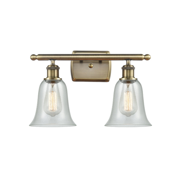 Hanover Bath Vanity Light shown in the Antique Brass finish with a Fishnet shade