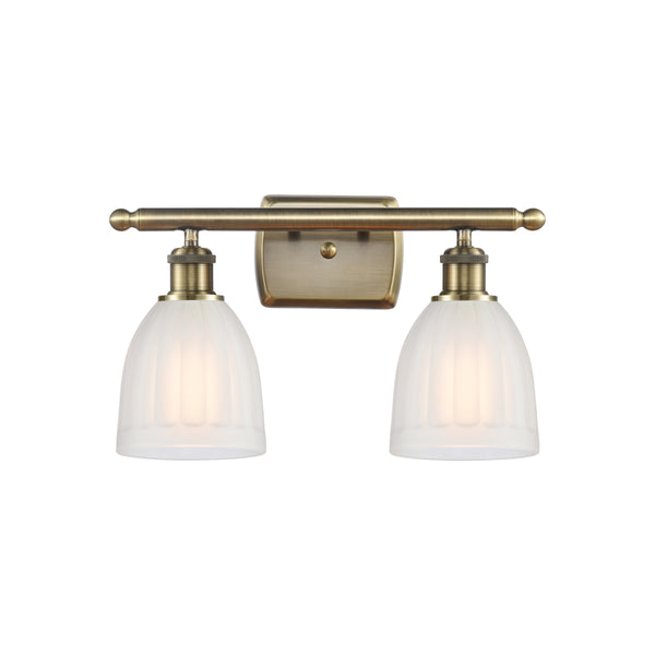Brookfield Bath Vanity Light shown in the Antique Brass finish with a White shade