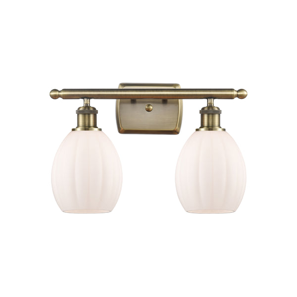 Eaton Bath Vanity Light shown in the Antique Brass finish with a Matte White shade