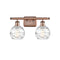Deco Swirl Bath Vanity Light shown in the Antique Copper finish with a Clear shade