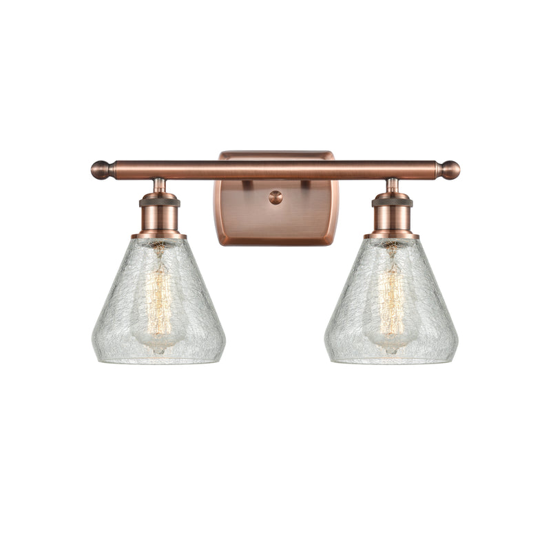 Conesus Bath Vanity Light shown in the Antique Copper finish with a Clear Crackle shade