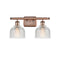 Dayton Bath Vanity Light shown in the Antique Copper finish with a Clear shade