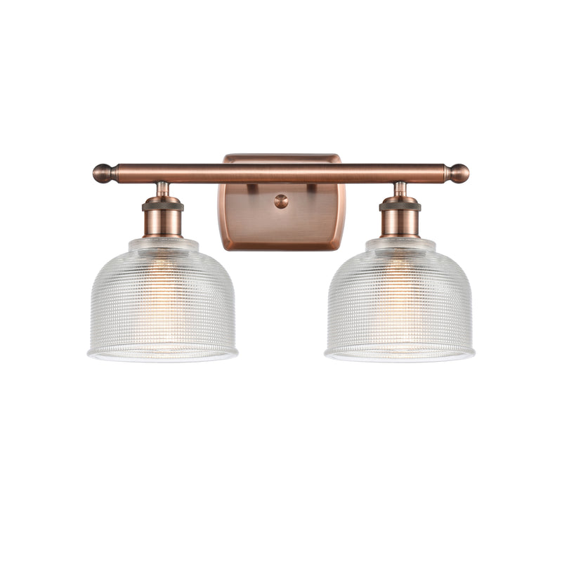 Dayton Bath Vanity Light shown in the Antique Copper finish with a Clear shade