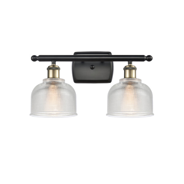 Dayton Bath Vanity Light shown in the Black Antique Brass finish with a Clear shade