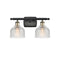 Dayton Bath Vanity Light shown in the Black Antique Brass finish with a Clear shade