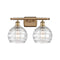 Deco Swirl Bath Vanity Light shown in the Brushed Brass finish with a Clear shade
