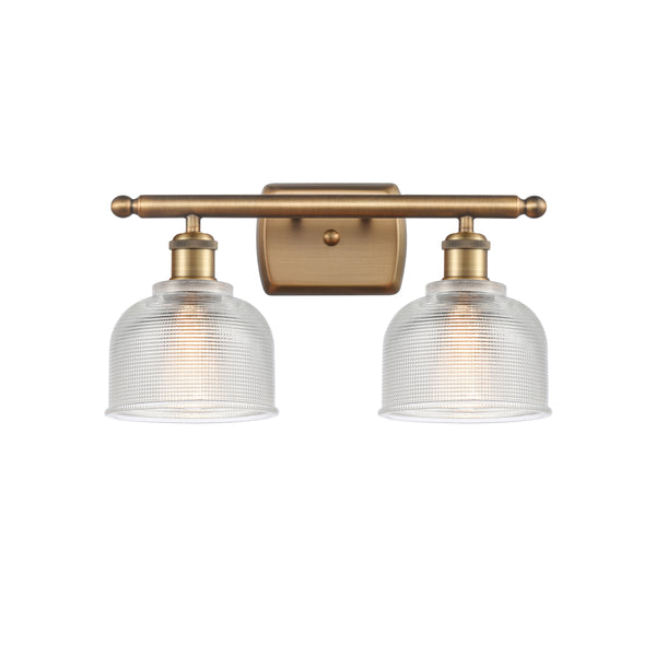 Dayton Bath Vanity Light shown in the Brushed Brass finish with a Clear shade