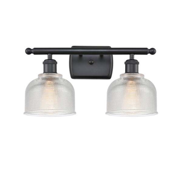 Dayton Bath Vanity Light shown in the Matte Black finish with a Clear shade
