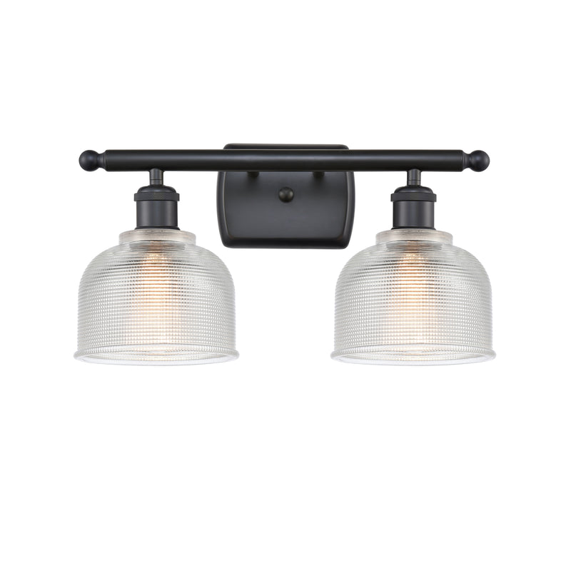 Dayton Bath Vanity Light shown in the Matte Black finish with a Clear shade