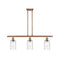 Candor Island Light shown in the Antique Copper finish with a Clear Waterglass shade