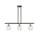 Deco Swirl Island Light shown in the Black Antique Brass finish with a Clear shade