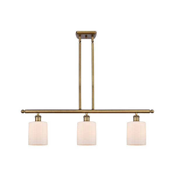 Cobbleskill Island Light shown in the Brushed Brass finish with a Matte White shade