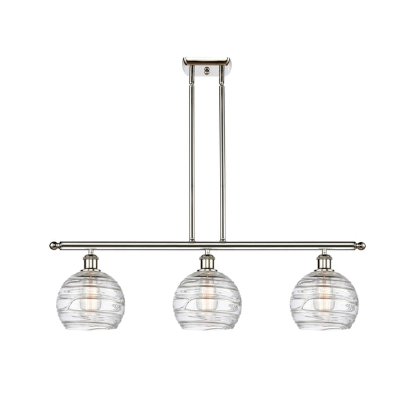Deco Swirl Island Light shown in the Polished Nickel finish with a Clear shade
