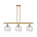 Deco Swirl Island Light shown in the Satin Gold finish with a Clear shade