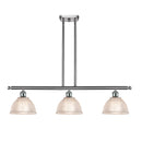 Arietta Island Light shown in the Brushed Satin Nickel finish with a Clear shade