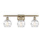 Deco Swirl Bath Vanity Light shown in the Antique Brass finish with a Clear shade