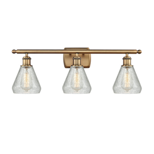 Conesus Bath Vanity Light shown in the Brushed Brass finish with a Clear Crackle shade