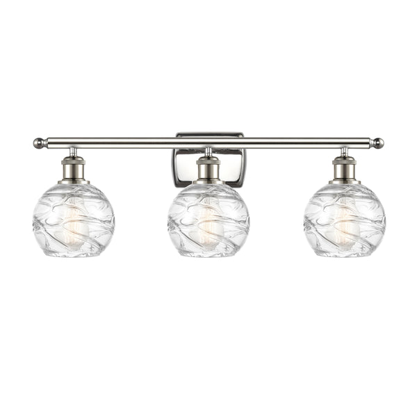 Deco Swirl Bath Vanity Light shown in the Polished Nickel finish with a Clear shade