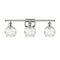 Deco Swirl Bath Vanity Light shown in the Polished Nickel finish with a Clear shade