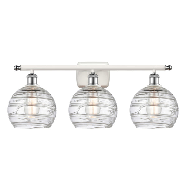 Deco Swirl Bath Vanity Light shown in the White and Polished Chrome finish with a Clear shade