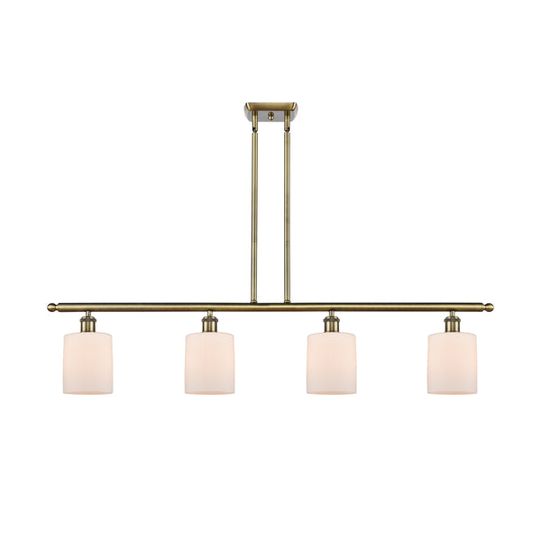 Cobbleskill Island Light shown in the Antique Brass finish with a Matte White shade