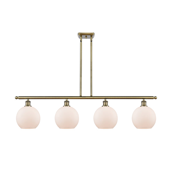 Athens Island Light shown in the Antique Brass finish with a Matte White shade