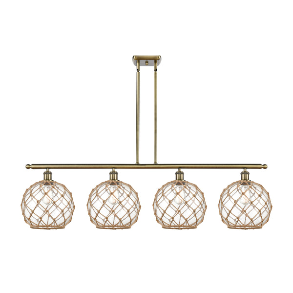 Farmhouse Rope Island Light shown in the Antique Brass finish with a Clear Glass with Brown Rope shade