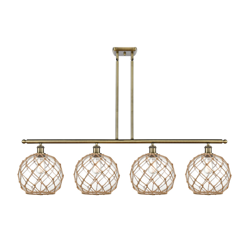 Farmhouse Rope Island Light shown in the Antique Brass finish with a Clear Glass with Brown Rope shade