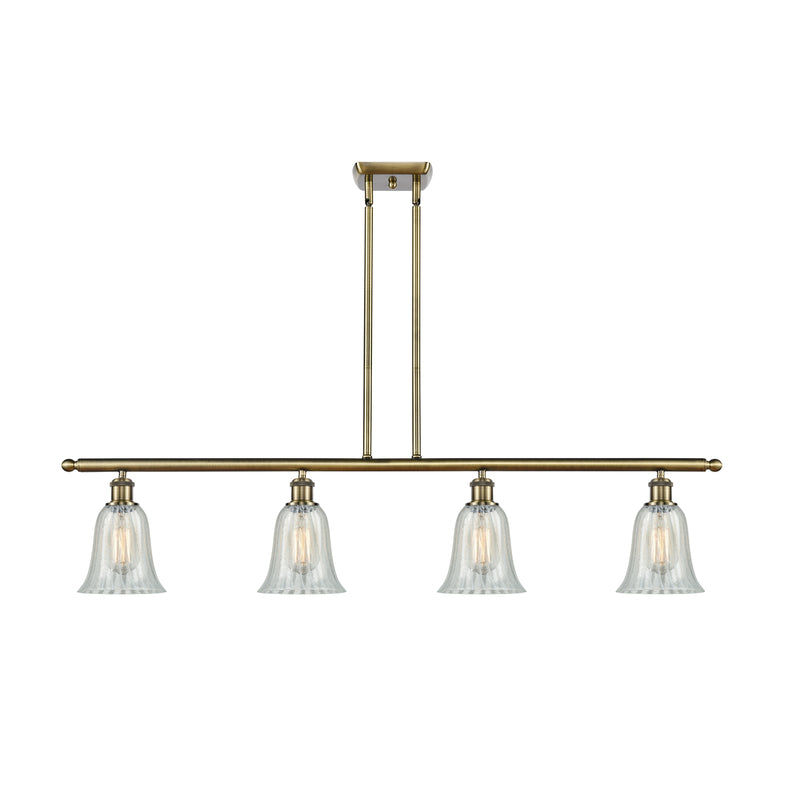 Hanover Island Light shown in the Antique Brass finish with a Mouchette shade