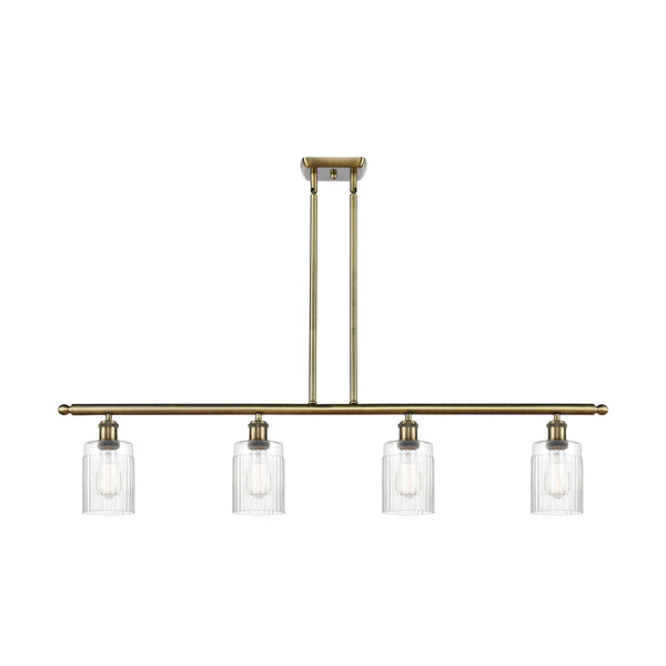 Hadley Island Light shown in the Antique Brass finish with a Clear shade