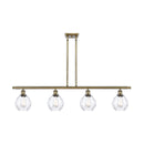 Waverly Island Light shown in the Antique Brass finish with a Clear shade