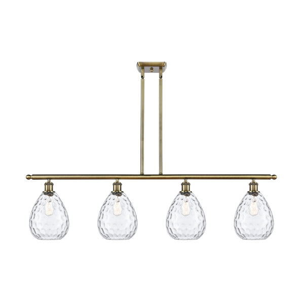 Waverly Island Light shown in the Antique Brass finish with a Clear shade