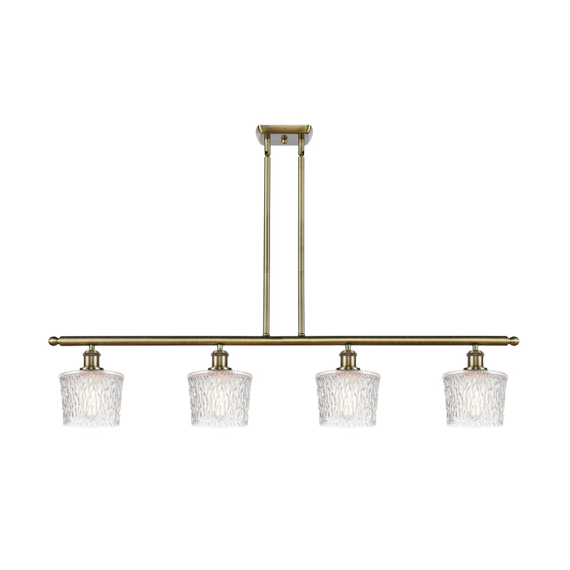 Niagra Island Light shown in the Antique Brass finish with a Clear shade