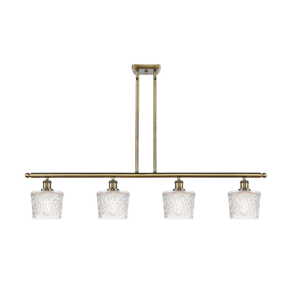 Niagra Island Light shown in the Antique Brass finish with a Clear shade