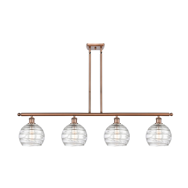 Deco Swirl Island Light shown in the Antique Copper finish with a Clear shade