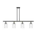 Candor Island Light shown in the Black Antique Brass finish with a Clear Waterglass shade