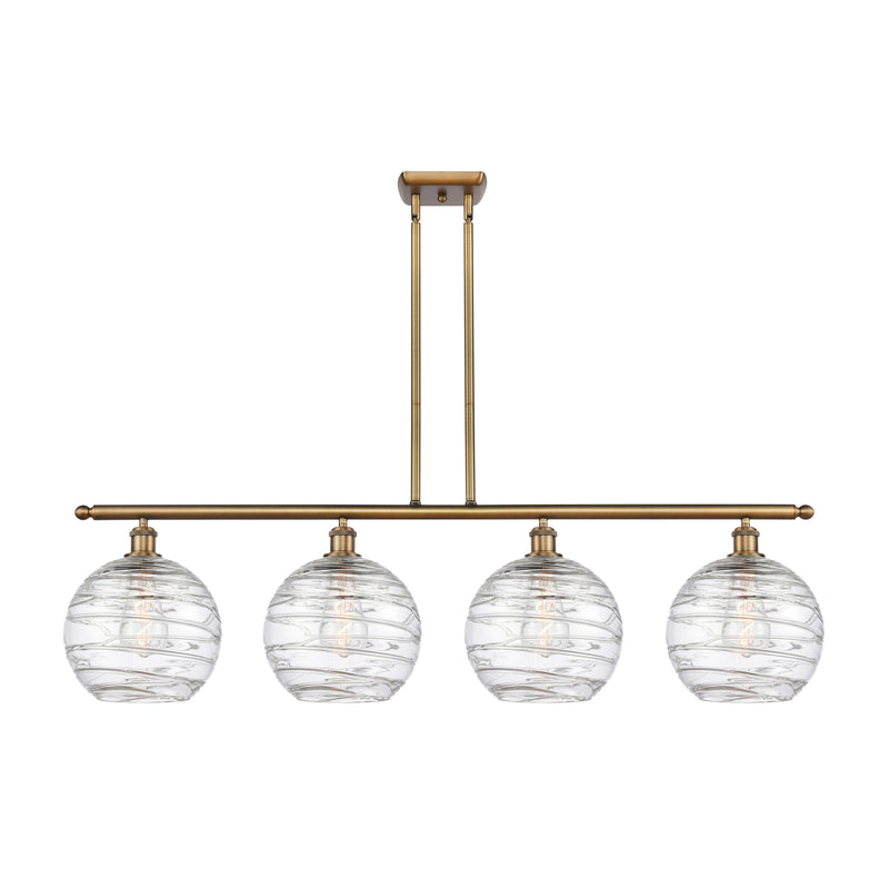 Deco Swirl Island Light shown in the Brushed Brass finish with a Clear shade